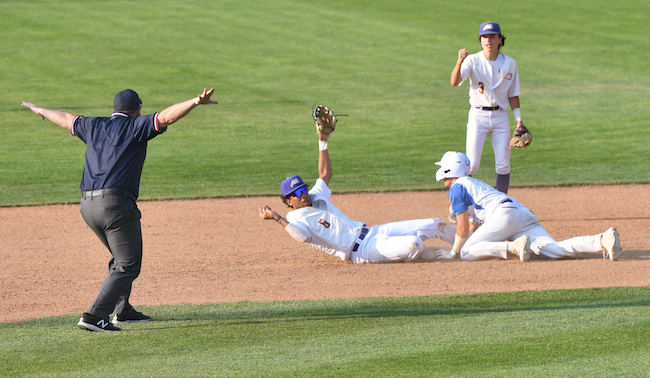 Jake Gauthier slides into second for a stolen base just ahead of the tag by PCA’s Jordan Scott (6).