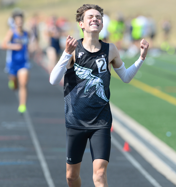 Hansen enjoys a moment of exhilaration after winning the 3,200 this spring at the LPD2 Finals at Ada Forest Hills Eastern.