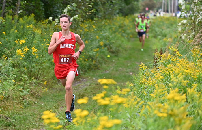 Marquette's Seppi Camilli (497) runs to first place in the boys Wildcat race held on the campus of Northern Michigan University. 