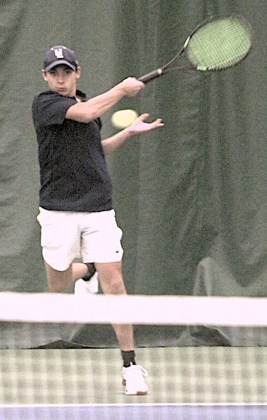 Liggett’s Sebastian Courtright returns a shot on the way to claiming the flight championship at No. 1 singles. 