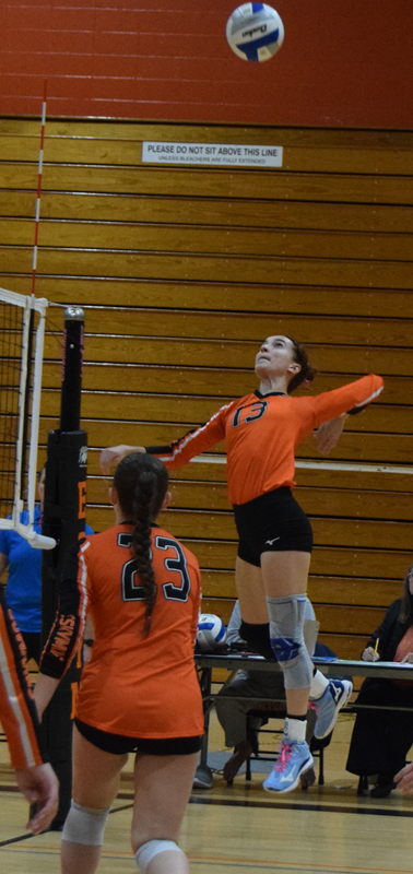 Cerma (13) ascends to kill the ball during a match against Manistique on Thursday.