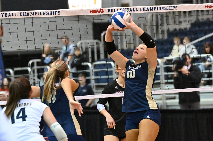 Traverse City St. Francis’ Tessah Konas (10) sets for an oncoming teammate during the Gladiators’ 22-25, 25-23, 25-22, 25-22 Division 3 Semifinal win. Konas and Reese Jones both had 22 assists to lead St. Francis. 
