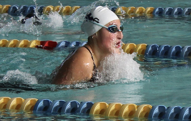 Adams swims one of her races this season. 