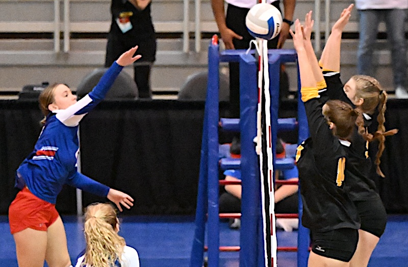 The No. 10-ranked Mountaineers (31-4-2) get over the net with a block during their Division 4 Semifinal win over the top-ranked Cougars 17-25, 19-25, 25-19, 25-16, 15-11.
