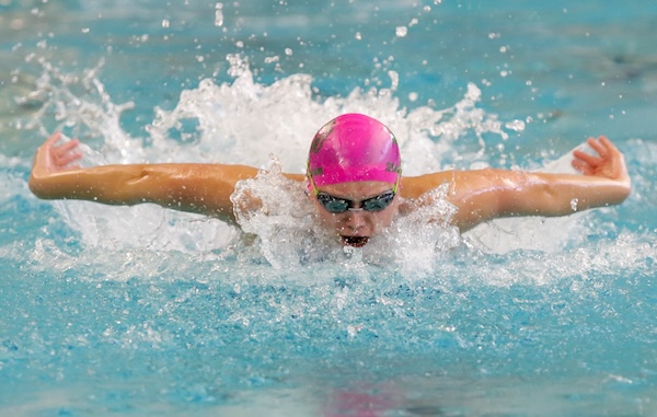 Flat Rock's Lauren McNamara swims to the championship in the 200 individual medley.