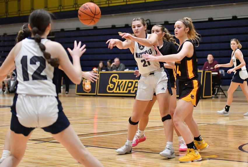 Marysville’s Avery Wolters passes to a teammate on the perimeter during her team’s loss to Davison at the Skippers Holiday Showcase on Dec. 28 at St. Clair County Community College. 
