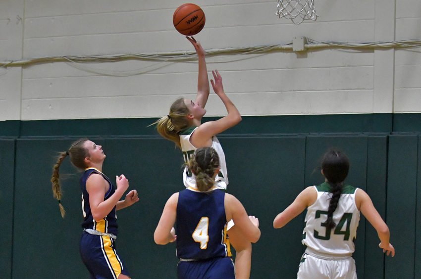 A Clare player gets to the basket during her team's 51-36 win over Ithaca.