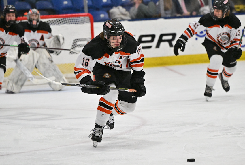 Brighton’s Cameron Duffany (16) leads a rush up the ice during his team’s overtime 4-3 Semifinal win over Clarkston. He scored the game’s first goal and added a second during the second period.