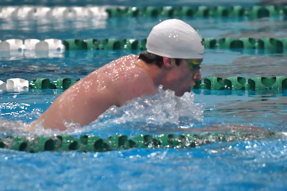 Groves’ Gus MacDonald swims to the victory in the individual medley.