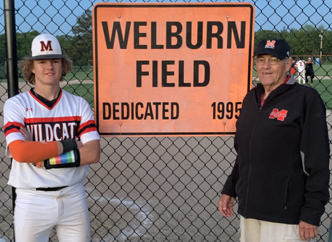 Marcellus freshman pitcher/third baseman Cale Hackenberg, left, stands with grandfather Ron Welburn, for whom the team’s field is named. 