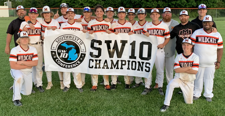  The Marcellus varsity baseball team and coaching staff hold up the Southwest 10 Conference championship banner last week after a doubleheader sweep of Cassopolis. 