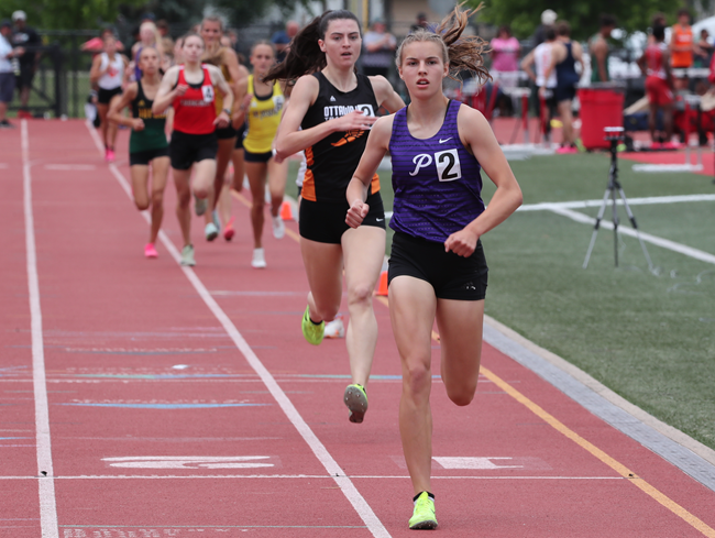 Ann Arbor Pioneer’s Rachel Forsyth leads the pack in the 1,600. 