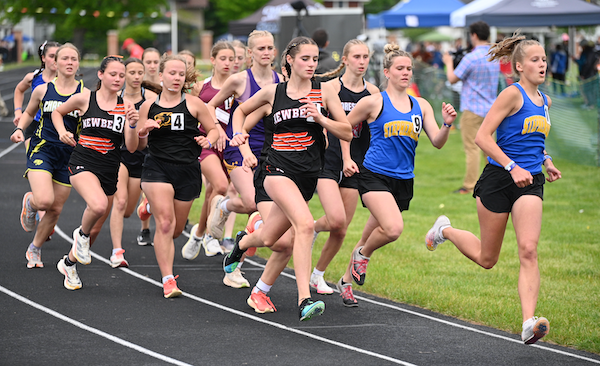 Stephenson's Faith Cappaert (11) takes the lead and doesn't relinquish it while winning the 800. 