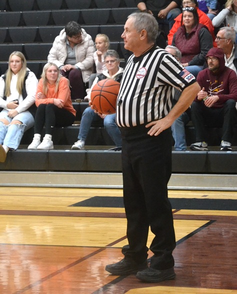 Allen waits at the baseline for action to resume.