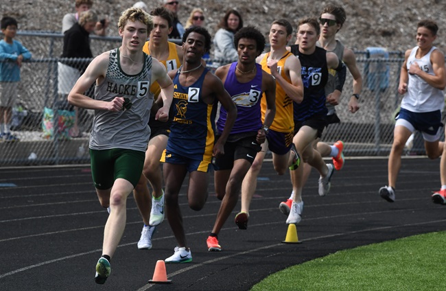 Hackett's Sean Siems and Royal Oak Shrine's Abenezer Cerone lead the 800 championship race; Cerone would go on to finish first. 