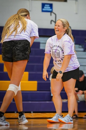 Alums Sarah Washegesic (right) and Megan Sollman share a laugh.
