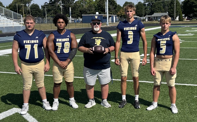 Fifth-year Niles head coach Scot Shaw, third from left, is pictured with seniors Chase Brawley (71), Brandon Hamilton (78), Brenden Olsen (3) and Ward Cheney (5).
