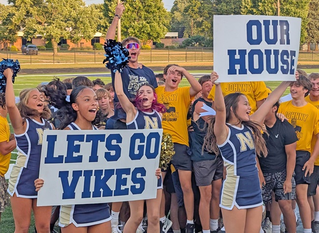 Members of the Niles cheerleading squad and student body get the crowd pumped up and showing their school spirit at a community-wide pep rally on Aug. 17.