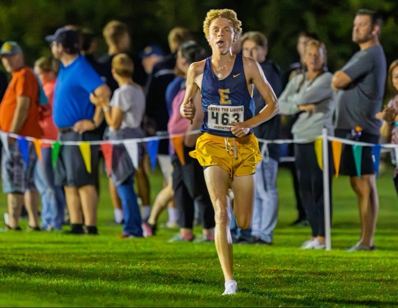 East Grand Rapids’ Jonah Workman runs at Grand Rapids South Christian’s Under the Lights Invite on Aug. 22.