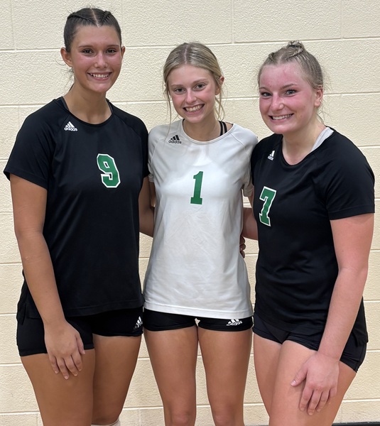 From left, Mendon four-year varsity volleyball letterwinners Nightingale, Jayden Samson and Gracie Schultz pose for a photo following the win over St. Philip.