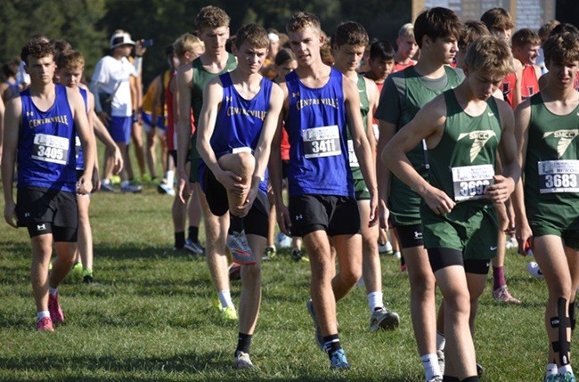Hulin stretches out prior to the start of the Division 3 boys race at Portage. 