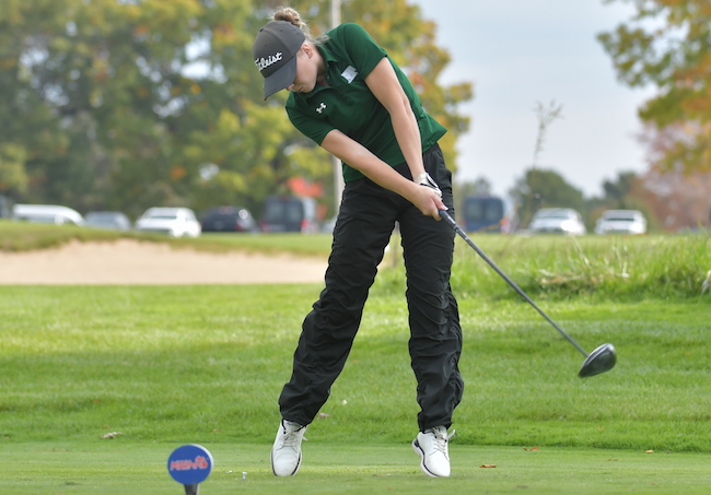 Muskegon Reeths-Puffer’s Sophia McCollum tees off.