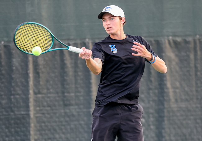 Rochester's Chad Anderson connects on a forehand.