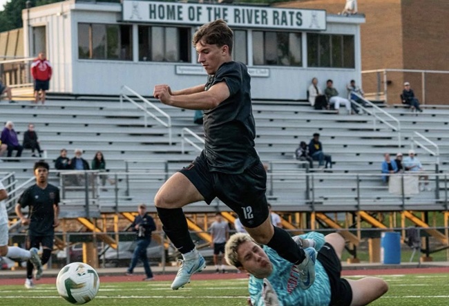 Andrew Rooks controls the ball as he charges up field.