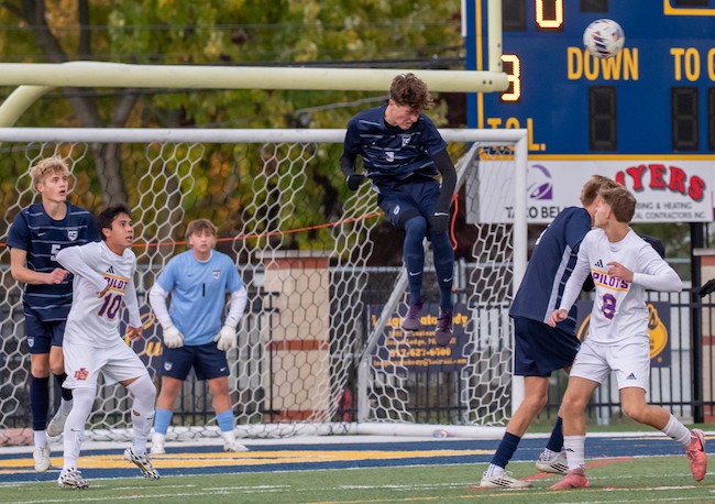 Berghuis gets up high to stop a shot headed toward his team’s goal. 