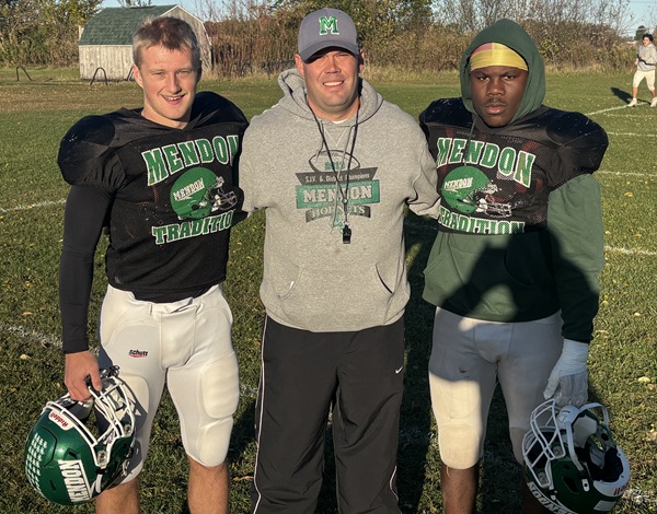 Pictured at practice last week, from left: Gorham, Mendon head coach Bobby Kretschman and JT Lux. 