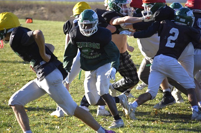 Lux (23) pursues a ballcarrier during a practice drill. 