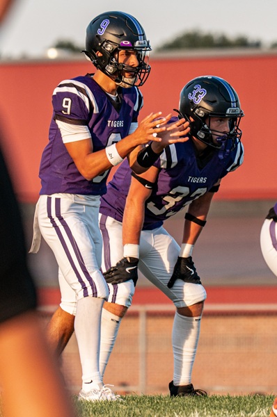 Isaac Garcia waits for the snap as running back Brody Fessenden stands ready. 