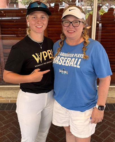 Villarreal takes a photo while pointing toward her mother Tonya.