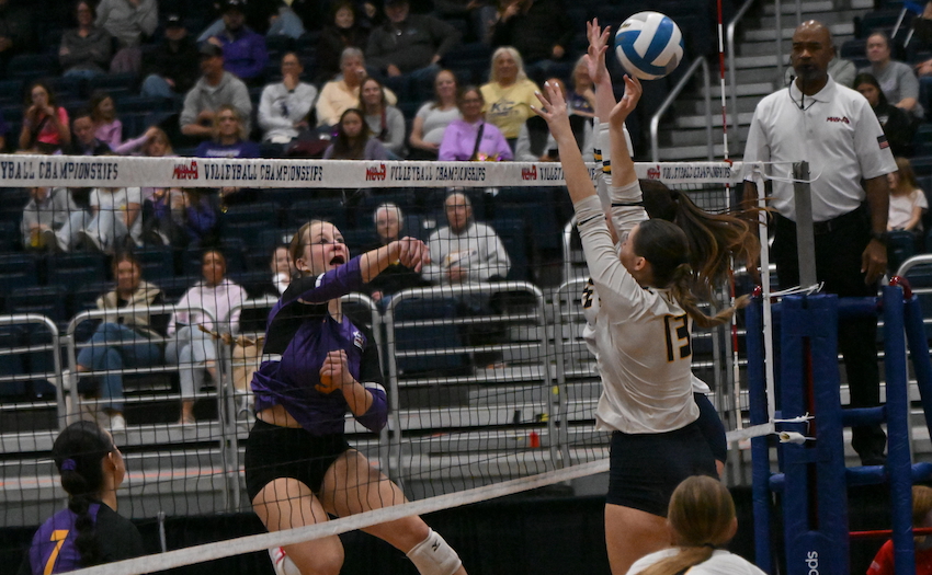 Kalamazoo Christian junior Eliana Keller unloads a kill attempt during her team’s 25-23, 25-16, 25-20 win over Saginaw Valley Lutheran.
