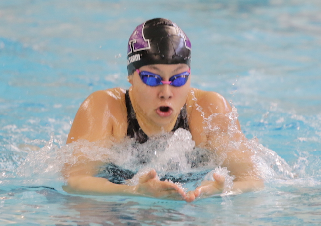 Ann Arbor Pioneer’s Tallulah Beg races to a championship in the 200 individual medley. 