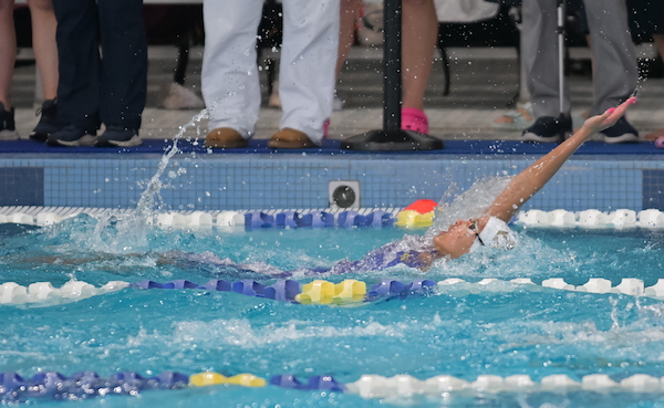 A swimmer does the backstroke during the LPD3 Finals.