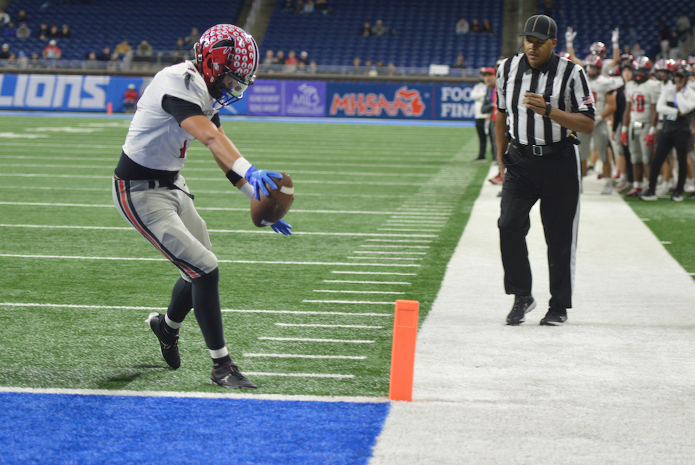 Antonio Solares-Vitti stretches across the goal line for a score.