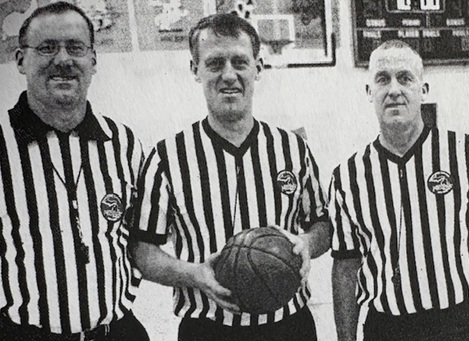 The Johnson brothers, here during their younger days, have a combined 127 yards of officiating to their credit.