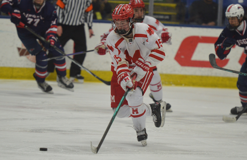 Orchard Lake St. Mary’s Emmett Pilch (15) leads a rush during his team’s 7-2 win over University Liggett (25-6) in Division 3 on Friday. He assisted on the Eaglets’ go-ahead goal during the second period.
