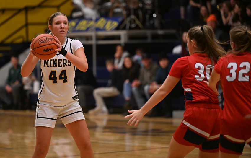 Negaunee's&nbsp;Clare O'Donnell looks for an open teammate during her team’s Dec. 19 win over Ishpeming Westwood.