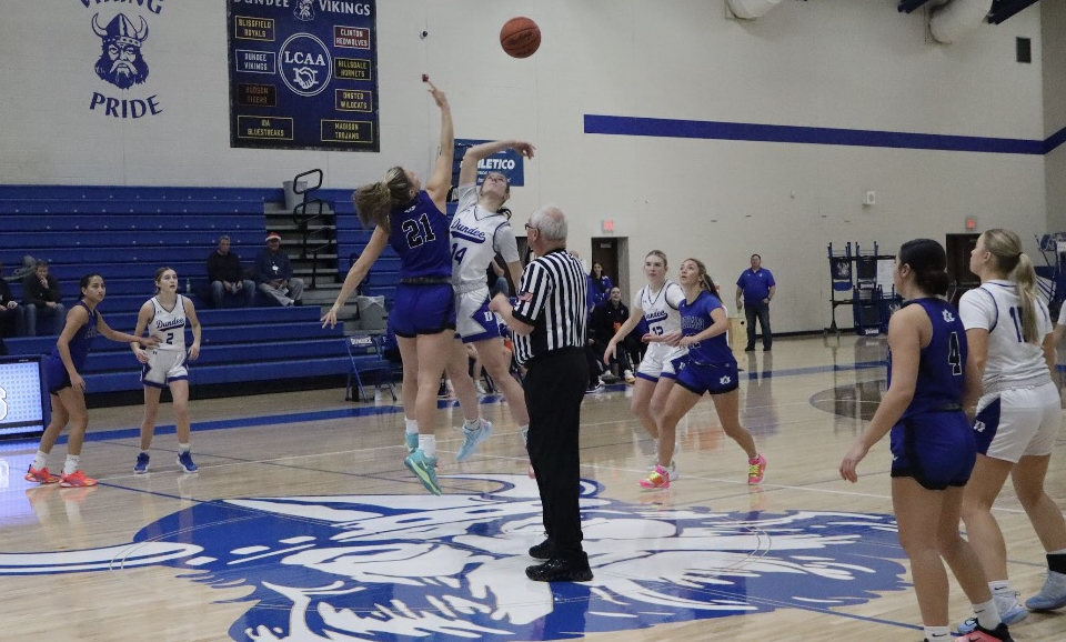 Salenbien (21) elevates for the opening tip at the start of a game against Dundee.