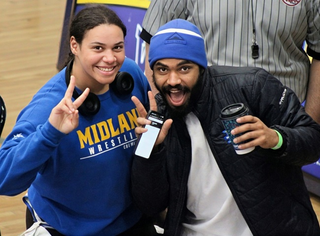 Halle takes a quick photo with her older brother and coach Hunter Spears.