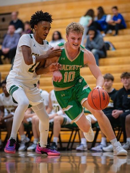 Leland Berg (10) makes a move toward the lane against Coloma.