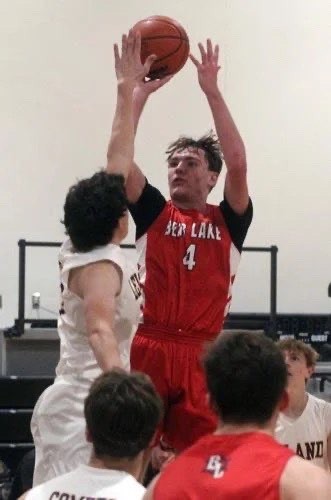 Myles Harless elevates for a jumper against Leland. 
