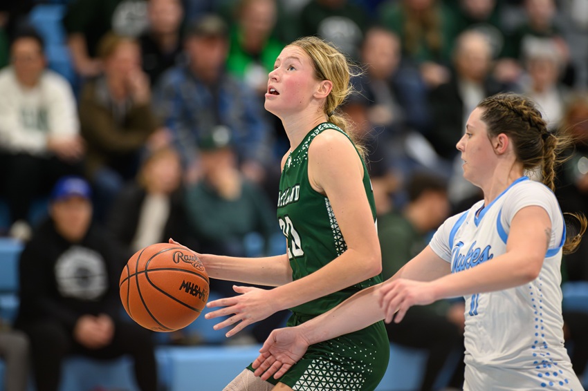 Freeland’s Joz Begick drives to the basket during the fourth quarter of her team’s December victory over Essexville Garber. 