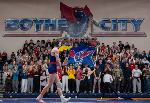 A Boyne City wrestler looks toward the student section. 
