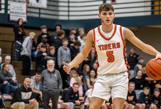  Phillips considers his next move with George looking on from the sideline.
