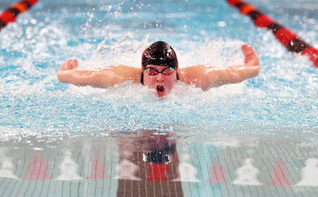 The Sentinels’ Kaytlin Roell powers to a win in the 100 butterfly. 