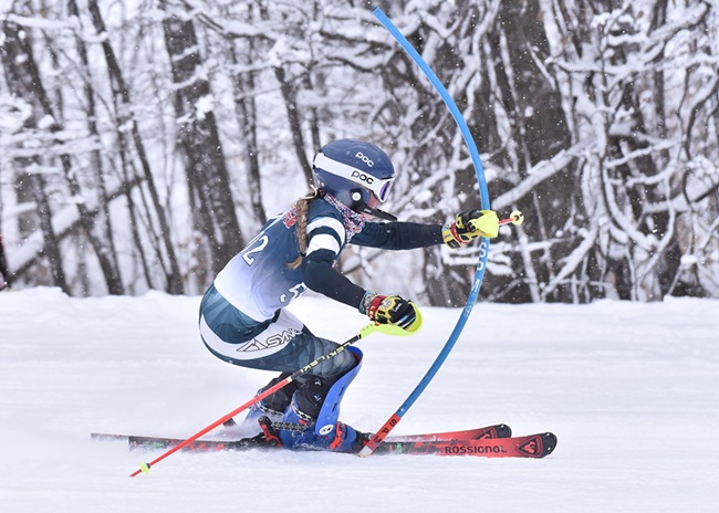 Detroit Country Day’s Annie Way slides past a gate on the way to finishing second in the slalom.