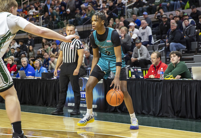 Summit’s Codey Bush (2) considers his options from the wing.